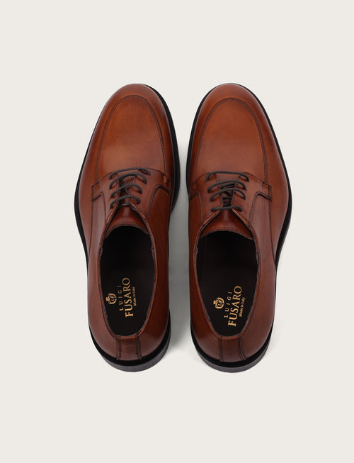 Derby in pelle con tacco in cuoio