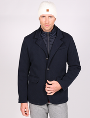 Knitted jacket with integrated bib