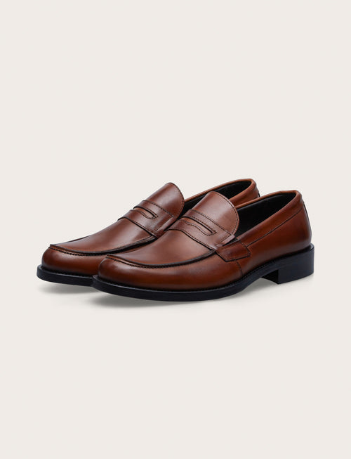 Leather moccasins with leather heel