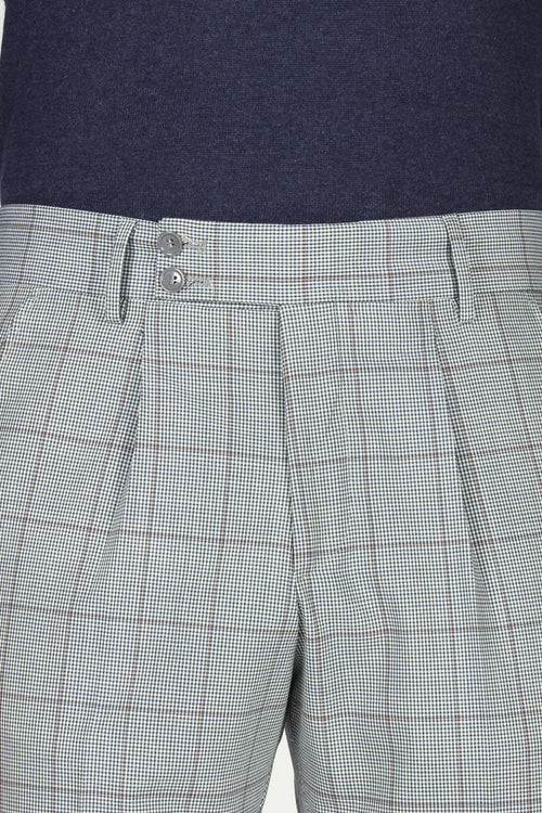 Pantaloni check con pinces in lana