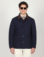 Giacca trapuntata con dettagli in velluto