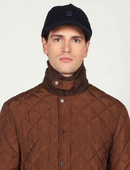 Giacca trapuntata con dettagli in velluto