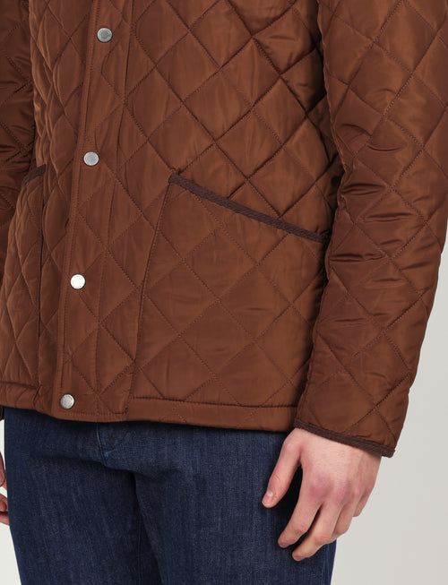 Giacca trapuntata con dettagli in velluto