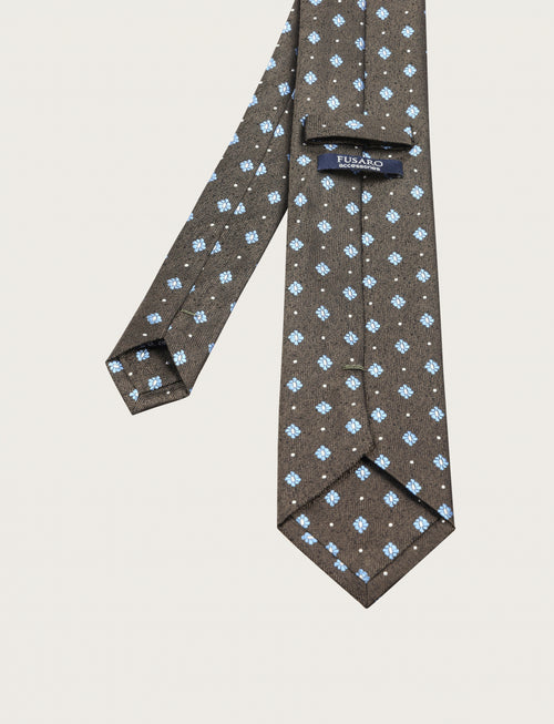 Cravatta in seta fantasia geometrica a micro motivo