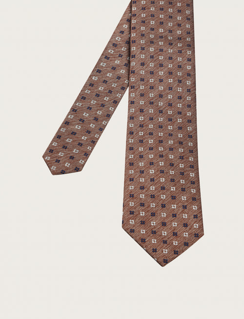 Cravatta in seta fantasia a piccoli quadrifogli