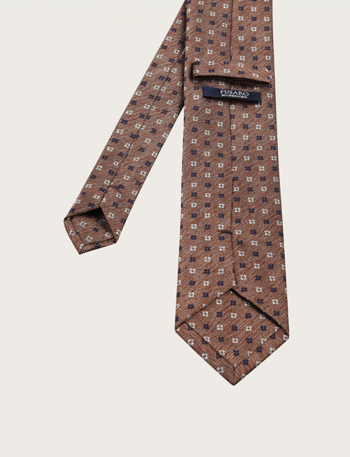 Cravatta in seta fantasia a piccoli quadrifogli
