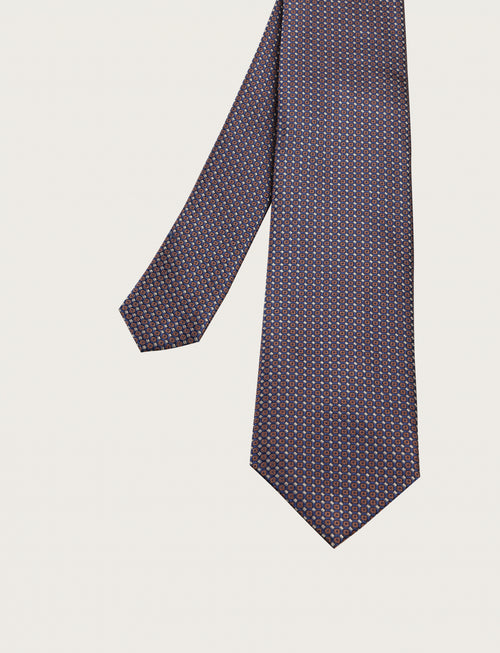 Cravatta in seta con micro fantasia geometrica all-over