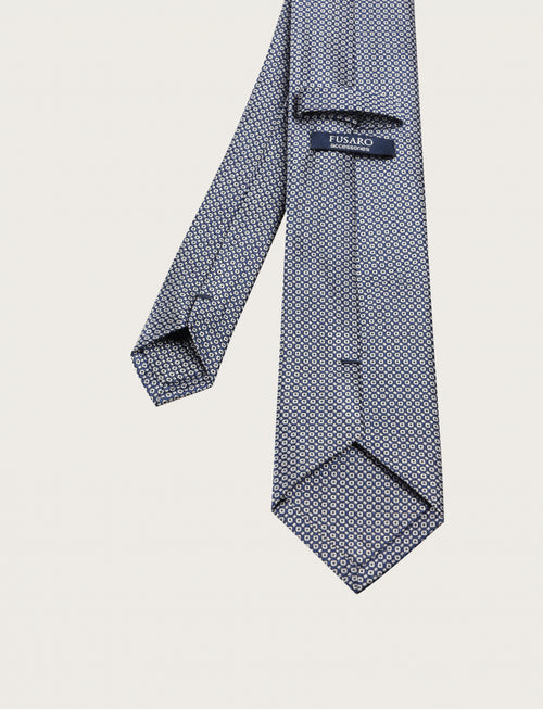 Cravatta in seta con micro fantasia geometrica all-over